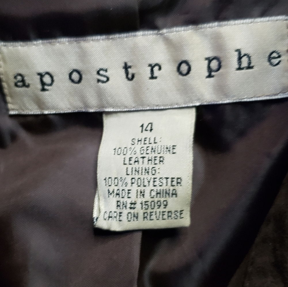 Brown leather jacket like new never been worn. Size 14.
